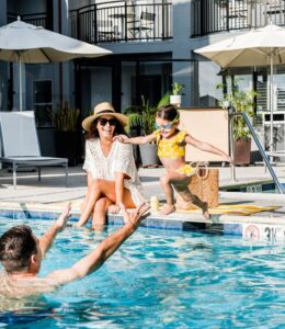 Family enjoying Ocean Park Inn pool